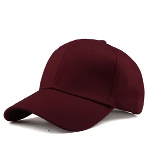 Close-up of wine red twill baseball cap showing reinforced stitching and eyelets