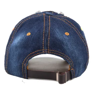 Navy denim baseball cap with orange stitching and adjustable leather back strap