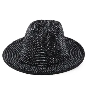 Macro shot of handcrafted black fedora hat with shimmering black rhinestone embellishments
