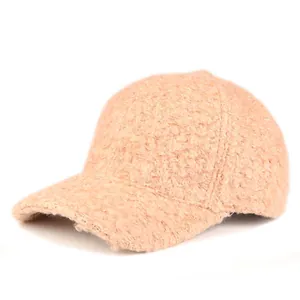 Thick warm women's baseball cap in peach pink textured fleece for outdoor autumn and winter
