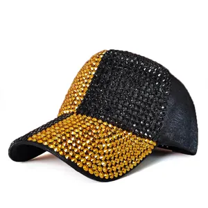 Detailed side view of luxury black baseball cap with sparkling gold rhinestone patterns