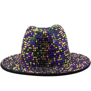 Detail of handmade sequins and colorful beads on a vintage Mardi Gras fedora hat