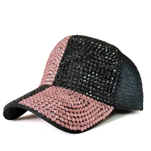 Sparkling rhinestone baseball cap with pink and black crystals and textured fabric