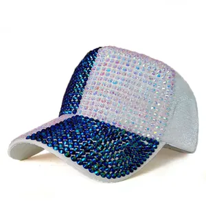 Fashionable baseball cap with sparkling rhinestones in blue and silver on grey fabric