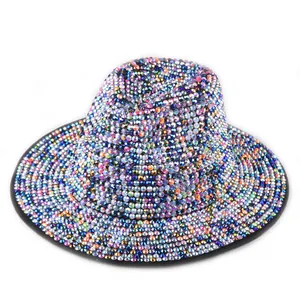 Close-up of rainbow rhinestones on a vintage fedora hat for stage performance