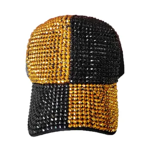 Macro detail of high-quality sparkling rhinestone baseball cap with black and gold color block