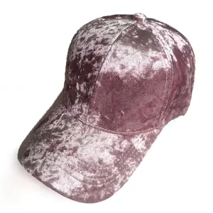 Detail shot of rose pink crushed velvet baseball cap showing fabric texture and stitching