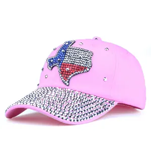 Detailed view of pink cotton baseball cap with Texas flag rhinestone map and crystal brim