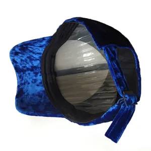 Navy blue velvet baseball cap showing inner structure and adjustable metal strap