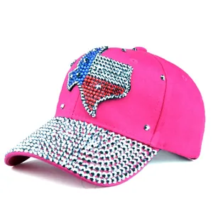 Detail of Texas map rhinestone pattern and silver studs on pink cotton baseball cap