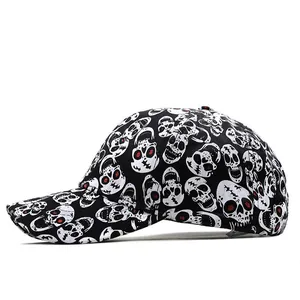 Black baseball cap with white skull prints and red eye accents for sun protection