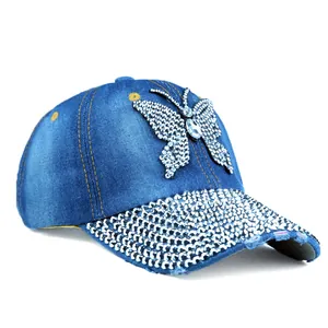Blue denim baseball cap with rhinestone butterfly motif and sparkling crystal brim