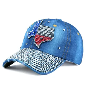 Detail of blue denim baseball cap with Texas rhinestone map and silver studs