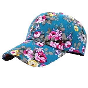 Blue floral baseball cap with pink and yellow roses and curved brim for summer outdoor sun