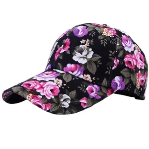 Women's black baseball cap with pink rose floral print and curved brim for sun protection