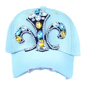 Light blue denim baseball cap with fleur-de-lis rhinestone pattern and distressed brim