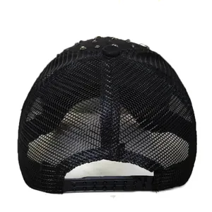 Rear view of black mesh baseball cap with stylish stud details and adjustable snapback strap
