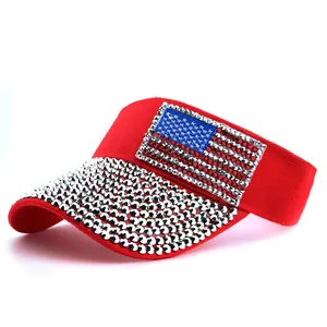 Detailed view of red sun visor with sparkling American flag and silver rhinestones