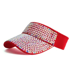 Detail of red sun visor with multicolored rhinestones and elastic open top design