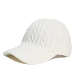 Detail of cable knit pattern and texture on a white winter knitted baseball cap