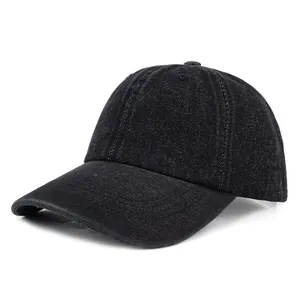 Detailed view of black denim baseball cap showing premium twill fabric and stitching