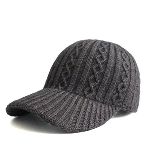 Detailed cable knit pattern on a dark grey wool-blend baseball cap for women