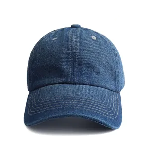 Classic dark blue denim baseball cap with six-panel structure and washed cotton texture