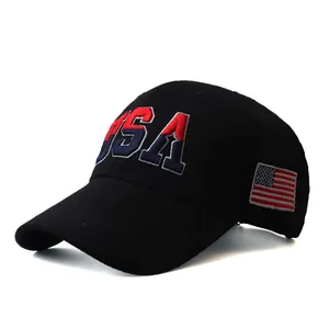 Detailed view of 3D USA embroidery and American flag on black cotton baseball cap