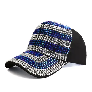 Detail of blue and silver rhinestones on black baseball cap with stripe pattern