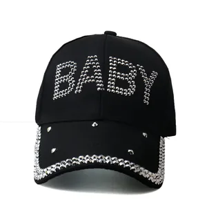 Unisex black baseball cap featuring rhinestone BABY letters and studded brim decor