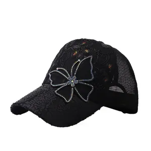 Dames baseballpet in zwart met mesh, pailletten, strass vlinder en geborduurde bloemen