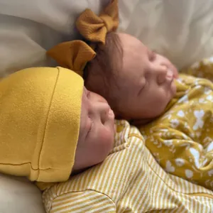 Realistic 19 inch Levi reborn baby doll with 3D skin texture and yellow baby outfits