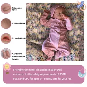 Lifelike 18-inch sleeping Reborn baby doll in pink floral outfit with detailed close-ups