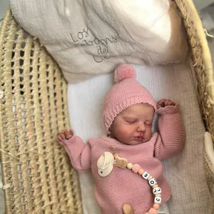 Lifelike 49cm Reborn Doll LouLou in pink knit outfit with Chloe pacifier clip