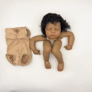 18 inch painted reborn doll kit with dark skin tone, curly black hair and fabric body
