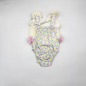 Cute polka dot baby romper with plush bunny ears and pink tulle flowers for 22 inch dolls
