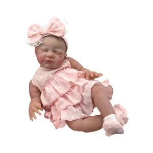 Realistic 19-inch sleeping reborn baby doll in pink polka dot lace dress and headband