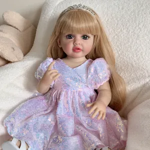 Poupée Reborn Betty 55cm réaliste avec cheveux blonds, diadème et robe à paillettes