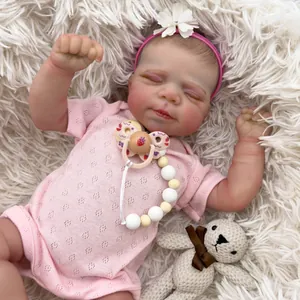 Bambola Reborn realistica da 19 pollici che dorme in abito di pizzo rosa con ciuccio e fascia