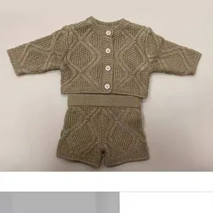 Two-piece beige cable knit sweater and shorts set for 55cm reborn baby dolls