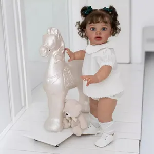 Lifelike 26 Inch Realistic Reborn Baby Doll Silicone Limbs Cloth Body Pippa With White Lace Outfit Curly Brown Hair Blue Eyes