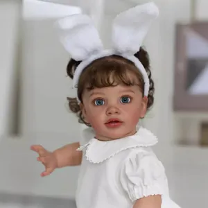 Realistic 26 inch toddler PIPPA doll with brown curly hair and bunny headband
