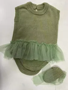 Detail of green knitted doll romper and matching hat with tulle tutu for 55cm baby doll