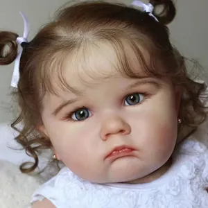 Poupée Charlotte bébé reborn réaliste 60cm avec cheveux bruns bouclés et robe dentelle