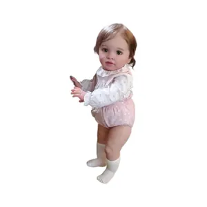 26-inch lifelike reborn baby doll Pippa with blue eyes and floral ruffle outfit