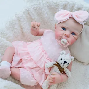 Detail of 18 inch reborn baby doll with blue eyes and magnetic Mommy pacifier