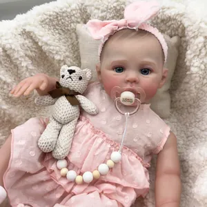 49cm reborn baby doll Meadow with 3D skin texture in pink polka dot dress and accessories