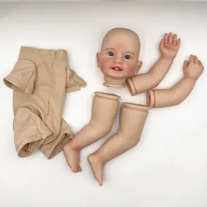 Macro view of 22-inch painted reborn doll kit with detailed vinyl head and cloth body parts