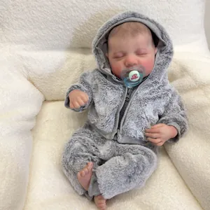 Realistic 49cm Reborn Doll Levi in grey plush hooded romper with blue pacifier