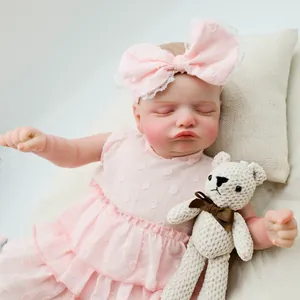 Poupée Reborn Rosalie réaliste 48cm en robe rose à pois avec petit ours en peluche